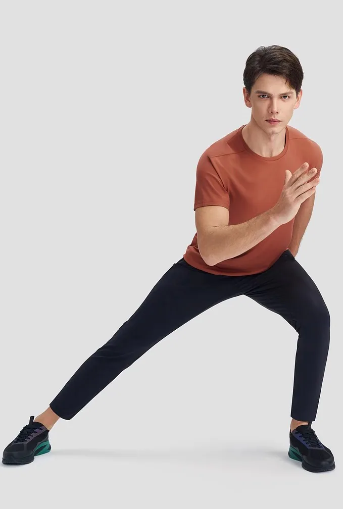 Pantaloni da corsa in tessuto resistente all'acqua SprintGuard da uomo