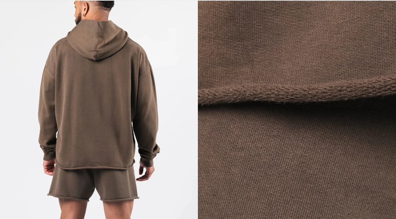 Sudadera con capucha vintage desgastada con lavado ácido y hombros caídos con borde crudo