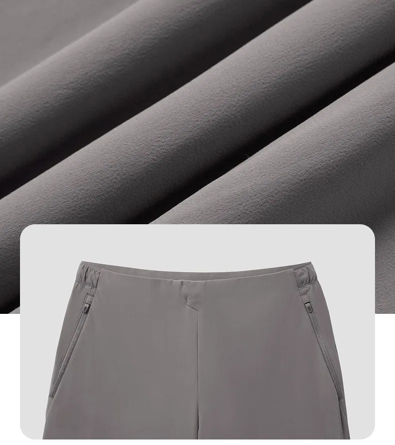 Pantaloni da corsa in tessuto resistente all'acqua SprintGuard da uomo