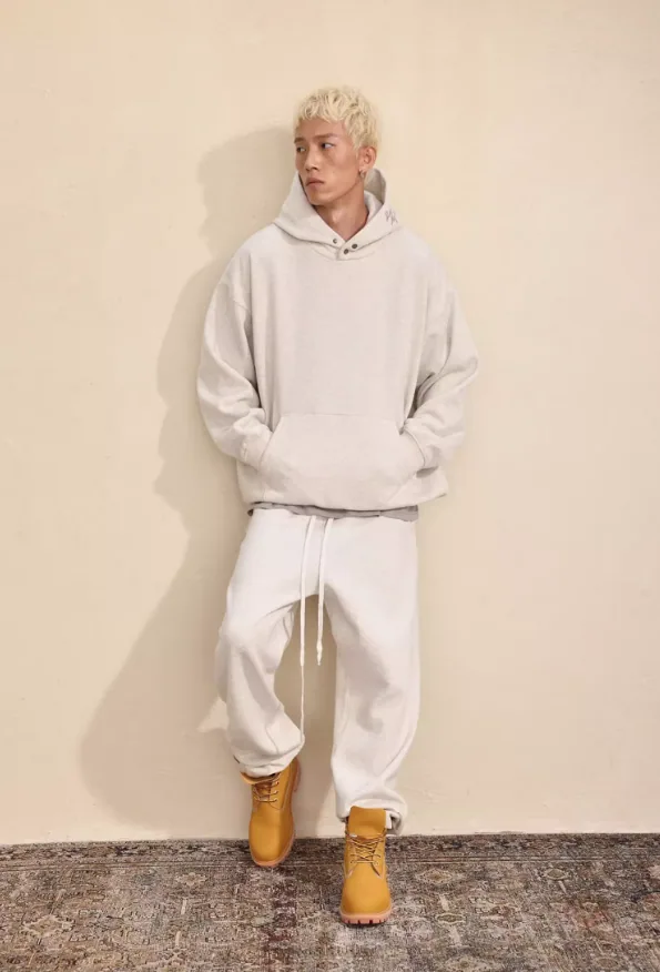 Felpa con cappuccio pullover con stampa floccata tinta unita stile urbano con tasca a marsupio